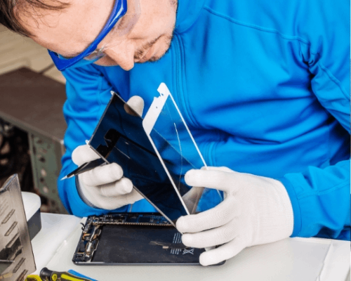 Technician assembling or repairing a touchscreen display module