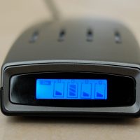 A Battery Charger with blue LCD