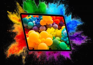 A vibrant display showing a cluster of colorful balloons against a black background